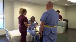 Physical Therapy Transfer Training  How To Transfer From Wheelchair To Bed [upl. by Saideman]